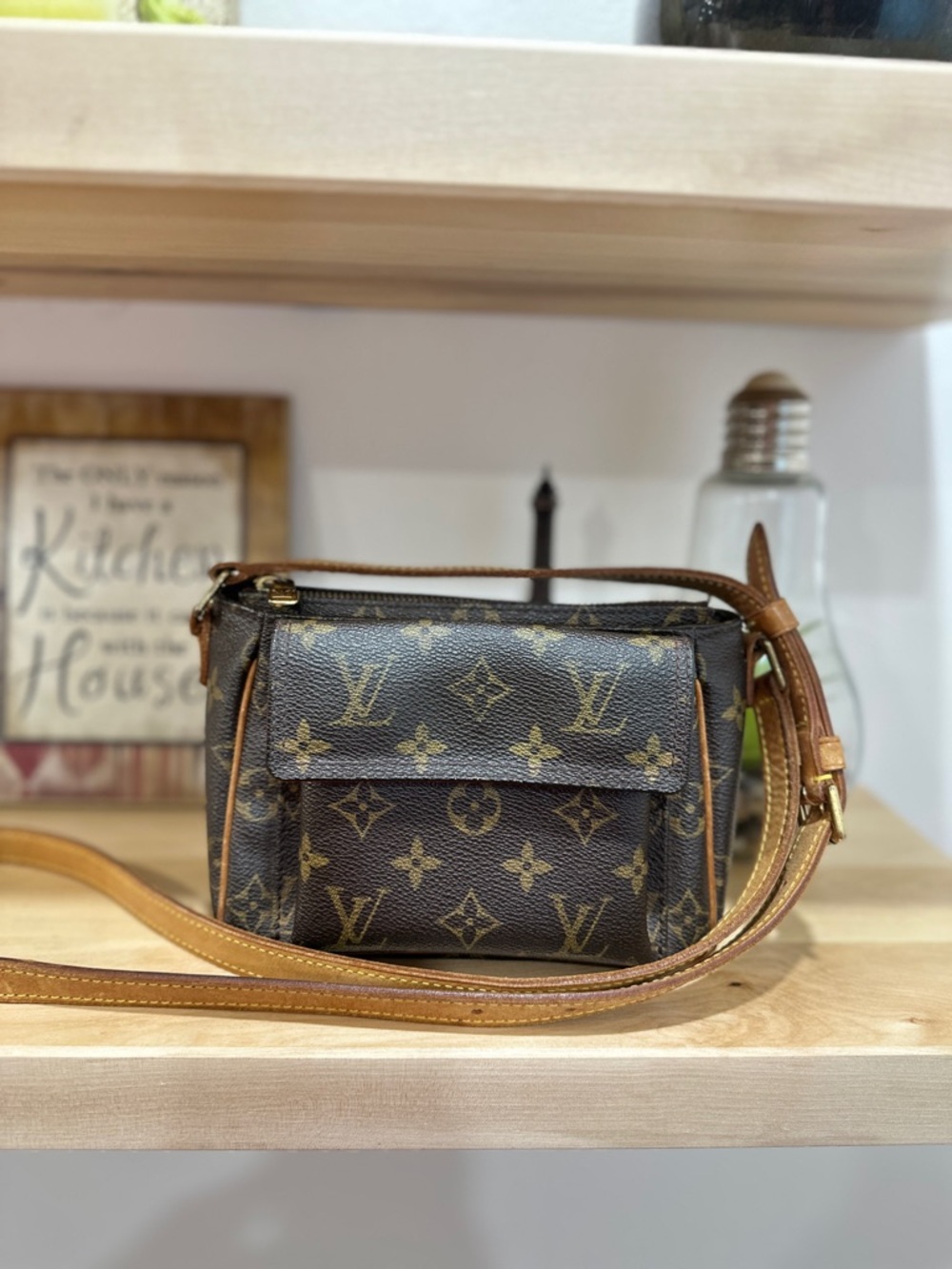 Authentic LOUIS VUITTON
Viva Cite PM Monogram Canvas Shoulder Bag